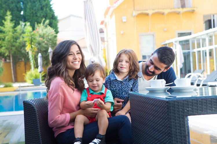 Family close to the pool